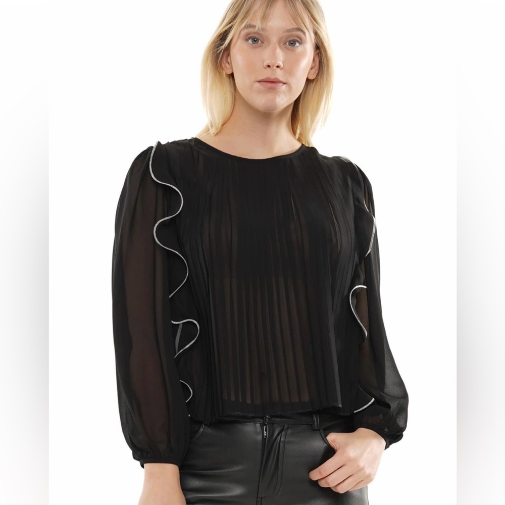 Black ruffled blouse
